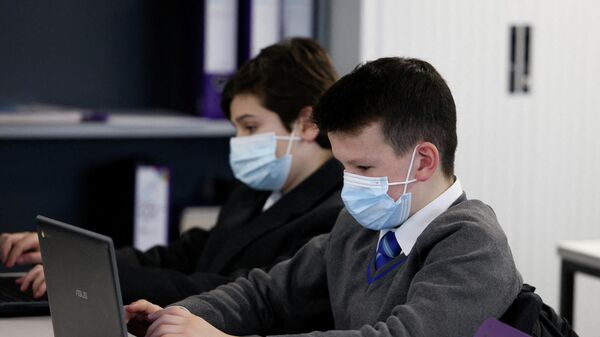 FILE PHOTO: Secondary schools return to mask wearing in England in new school term - Sputnik International