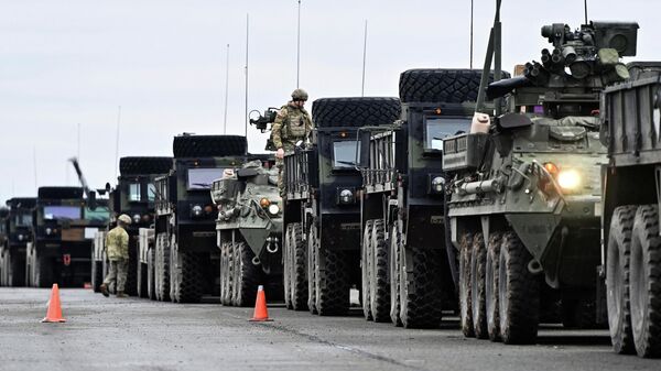 Combat vehicles are prepared for deployment to Romania at Rose Barracks in Vilseck, Germany, February 9, 2022 - Sputnik International