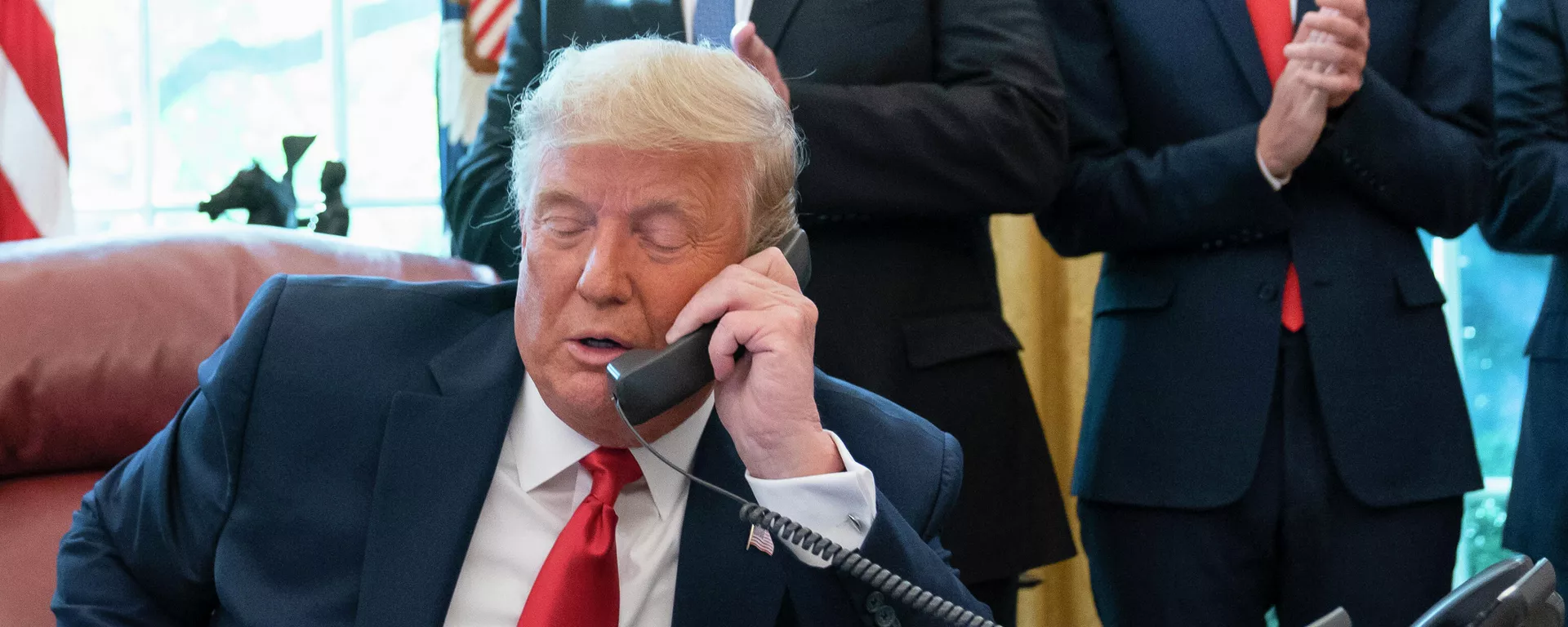  In this Oct. 23, 2020, photo, President Donald Trump talks on a phone during a call with the leaders of Sudan and Israel in the Oval Office of the White House, in Washington.  - Sputnik International, 1920, 19.07.2024