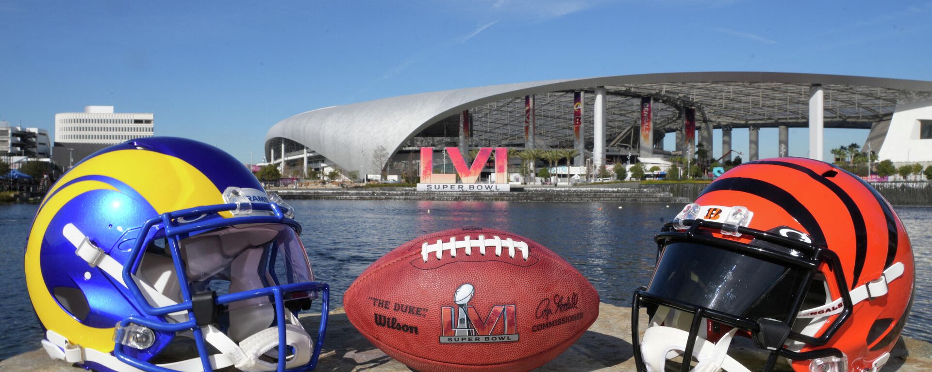 Feb 8, 2022; Inglewood, CA, USA; Los Angeles Rams and Cincinnati Bengals helmets are seen with a Wilson NFL official Duke football and the SBLVI numerals at SoFi Stadium - Sputnik International, 1920, 13.02.2022