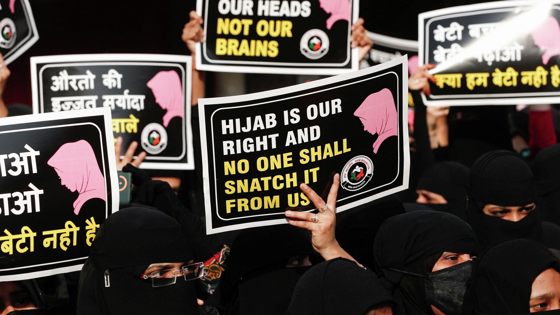Women hold placards during a protest, organised by Hum Bhartiya, against the recent hijab ban in few colleges of Karnataka state, on the outskirts of Mumbai, India, February 11, 2022. - Sputnik International, 1920, 12.02.2022