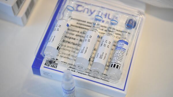 Ampules with of Sputnik V (Gam-COVID-Vac) vaccine against the coronavirus disease are pictured during a vaccination at River Park hotel, in Novosibirsk, Russia. - Sputnik International