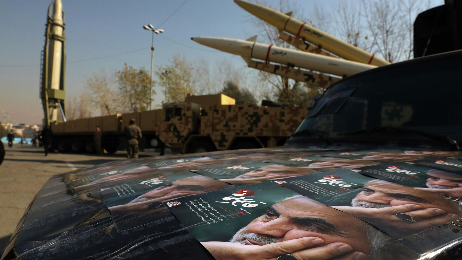 Posters of Iranian Gen. Qassem Soleimani, who was killed in Iraq in a U.S. drone attack in Jan. 3, 2020, are seen in front of Qiam, background left, Zolfaghar, top right, and Dezful missiles displayed in a missile capabilities exhibition by the paramilitary Revolutionary Guard a day prior to second anniversary of Iran's missile strike on U.S. bases in Iraq in retaliation for killing Gen. Soleimani, at Imam Khomeini grand mosque, in Tehran, Iran, Friday, Jan. 7, 2022. Iran put three ballistic missiles on display on Friday, as talks in Vienna aimed at reviving Tehran's nuclear deal with world powers flounder.  - Sputnik International, 1920, 14.02.2022