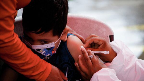 Honduras vaccinate children aged 5-11 for COVID-19, in Tegucigalpa - Sputnik International