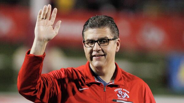 FILE - Joseph I. Castro, at the time president of Fresno State, waves to the crowd before the team's NCAA college football game Nov. 4, 2017, against BYU in Fresno, Calif. - Sputnik International