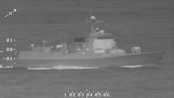 A Royal Australian Air Force (RAAF) reconnaissance photo of a Peoples Liberation Army-Navy Luyang-class guided missile destroyer involved in a lasing incident with an RAAF P-8A Poseidon maritime patrol aircraft. - Sputnik International