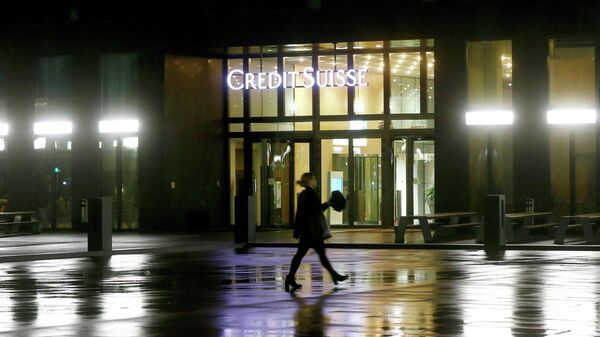 The logo of Swiss bank Credit Suisse is seen at an office building in Zurich, Switzerland February 21, 2022 - Sputnik International