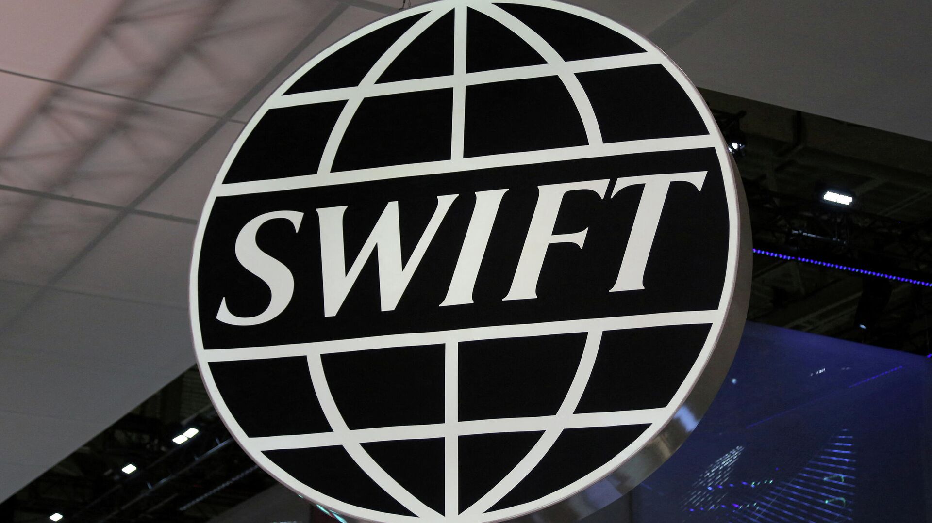 The logo of global secure financial messaging services cooperative SWIFT is seen at the SIBOS banking and financial conference in Toronto, Ontario, Canada October 19, 2017 - Sputnik International, 1920, 26.02.2022