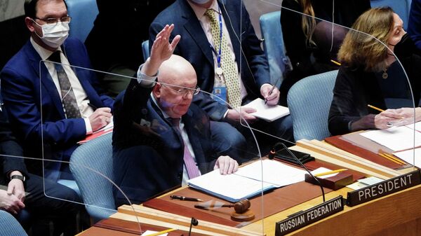 Russia's Ambassador to the United Nations Vassily Nebenzia votes during a United Nations Security Council meeting, on a resolution regarding Russia's actions toward Ukraine, at the United Nations Headquarters in New York City, U.S., February 25, 2022. - Sputnik International