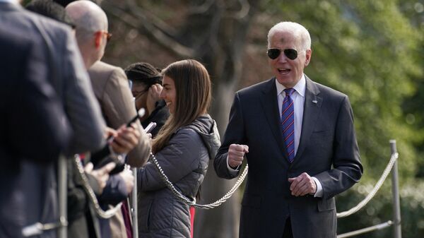 U.S. President Joe Biden gestures while greeting visitors upon his departure from the White House on Ash Wednesday, in Washington, D.C., U.S., March 2, 2022 - Sputnik International