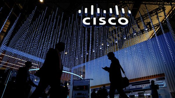People pass by Cisco stand at the GSMA's 2022 Mobile World Congress (MWC) in Barcelona, Spain March 1, 2022 - Sputnik International