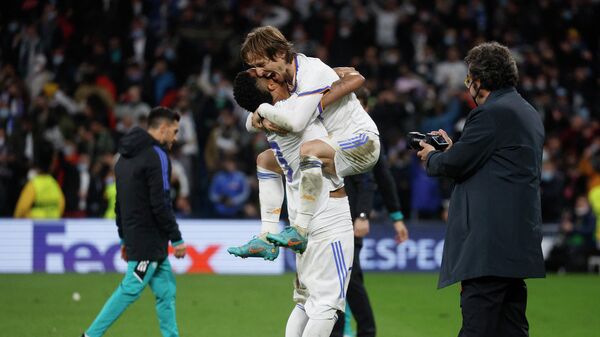 Real Madrid's Eder Militao celebrates with Luka Modric after the match - Sputnik International