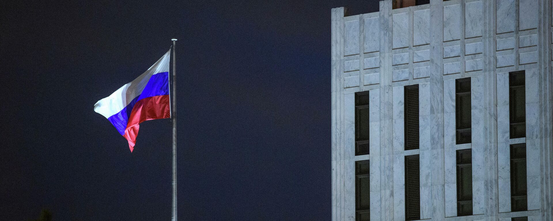 The Russian flag flies above the Embassy of Russia in Washington, DC, on March 3, 2022 - Sputnik International, 1920, 17.03.2022