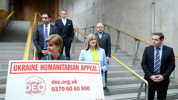 Scotland's First Minister and leader of the Scottish National Party, Nicola Sturgeon, launches Ukraine Humanitarian appeal with other party leaders at the parliament in Edinburgh - Sputnik International