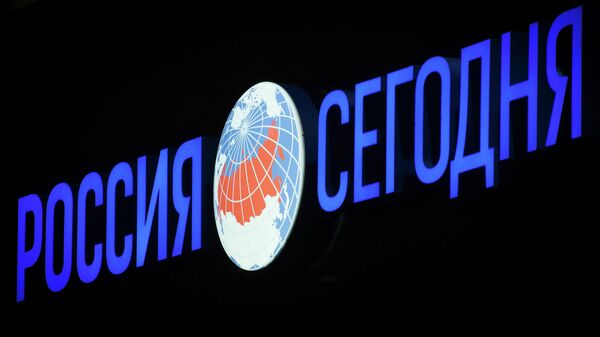 A signboard of the Rossiya Segodnya international news agency at the entrance to the agency's building. - Sputnik International
