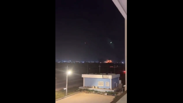 A screenshot from the video of an alleged airstrike in Erbil, Iraq on March 13, 2022. - Sputnik International