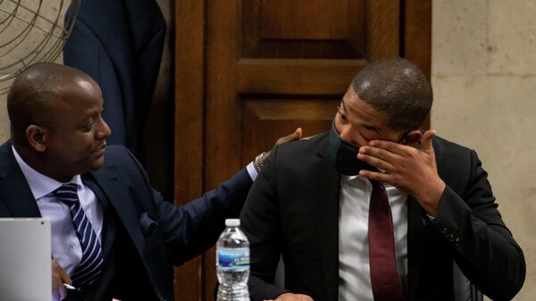 Actor Jussie Smollett wipes away tears after his grandmother testified at his sentencing hearing on March 10, 2022 in Chicago, Illinois - Sputnik International