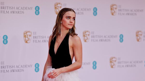 British actress Emma Watson poses on the red carpet upon arrival at the BAFTA British Academy Film Awards at the Royal Albert Hall, in London, on March 13, 2022.  - Sputnik International