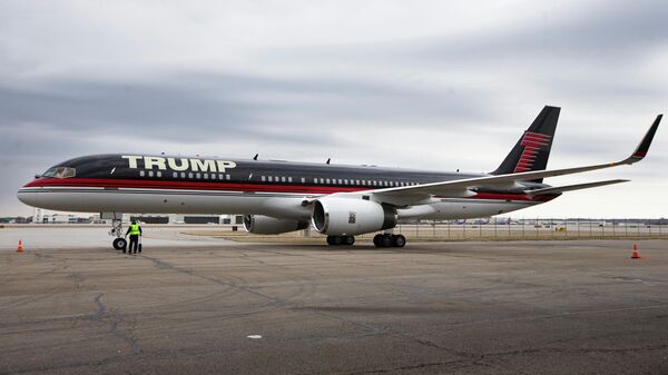 In this March 1, 2016 file photo, Republican presidential candidate Donald Trump's private jet arrives at Port-Columbus International Airport, in Columbus, Ohio. President Donald Trump's private jet, an instantly recognizable Boeing 757 used during his campaign, was caught up in a quintessential New York City traffic mishap at LaGuardia Airport on Wednesday, Nov. 28, 2018: a fender bender while someone else was trying to park. A corporate jet maneuvering into a parking spot clipped the wing of Trump's parked plane around 8:30 a.m., Trump's company, The Trump Organization, confirmed. - Sputnik International