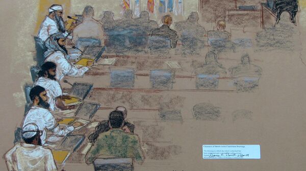 This Wednesday, Jan. 21, 2009 sketch reviewed by the U.S. military, shows, from top left, Khalid Shaikh Mohammad; Walid bin Attash; Ramzi bin al Shibh; Ali Abdul Aziz Ali, also known as Ammar al Baluchi, and Mustafa al Hawsawi attend a hearing at the U.S. Military Commissions court for war crimes at the U.S. Naval Base in Guantanamo Bay, Cuba. On Friday, Aug. 30, 2019, a military judge set Jan. 11, 2021 for the start of the long-stalled war crimes trial of the five men being held at the Guantanamo Bay prison on charges of planning and aiding the Sept. 11 terrorist attacks - Sputnik International