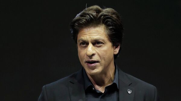 Indian actor Shah Rukh Khan delivers a speech when receiving a Crystal Award during a ceremony on the eve of annual meeting of the World Economic Forum in Davos, Switzerland, Monday, Jan. 22, 2018 - Sputnik International