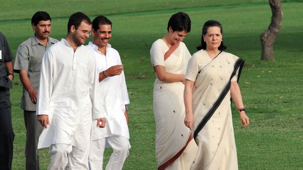 India's Congress Party President Sonia Gandhi (R), her daughter Priyanka Gandhi (2R), her son Rahul Gandhi (2L) and husband of Priyanka, Robert Vadra (3L)  - Sputnik International