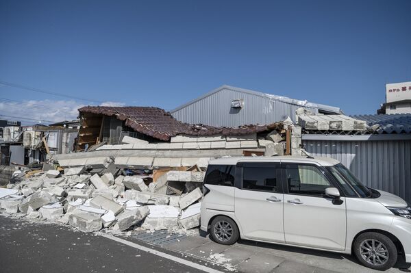 A collapsed barn is seen in Soma, Fukushima Prefecture on March 17, 2022, after a 7.3-magnitude earthquake jolted east Japan the night before - Sputnik International