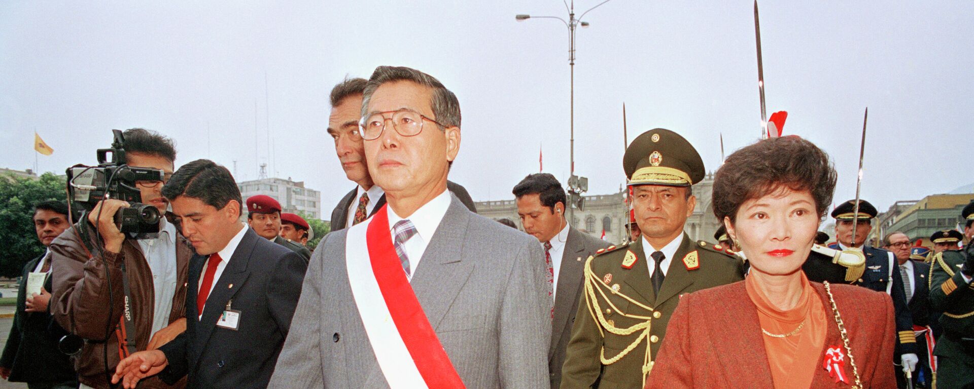 Peruvian President Alberto Fujimori and first lady Susana Higuchi attend an Independence Day celebration, in their last public appearance together, in Lima, Peru, July 28, 1994. Higuchi died on Wednesday, Dec. 8, 2021 at the age of 73, confirmed her daughter Keiko Fujimori. - Sputnik International, 1920, 17.03.2022