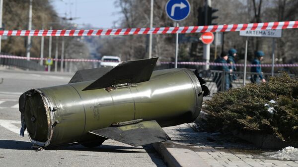 A fragment of an Ukrainian Tochka-U missile which had been shot down near the Government House in the city center during a recent shelling is pictured in Donetsk, Donetsk People's Republic. - Sputnik International