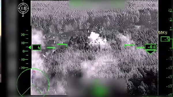 The Russian Defence Ministry on Saturday released video footage showing Ka-52 helicopter attacks against enhanced team sites of Ukrainian nationalists and the destruction of one of them - Sputnik International