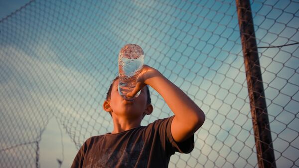 boy drinking water - Sputnik International