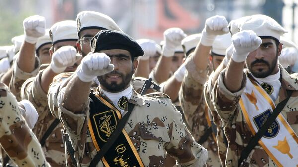 Iran's elite Revolutionary Guards march during a military parade in Tehran on September 21, 2008 - Sputnik International