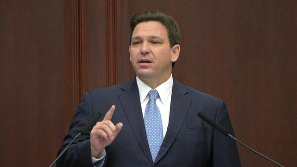 Florida Gov. Ron DeSantis addresses a joint session of a legislative session, Jan. 11, 2022, in Tallahassee, Fla.  - Sputnik International