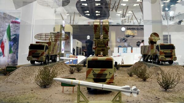 A model of an Iranian Bavar-373 (AD-200) launch system missile is seen at a stand at the DIMDEX exhibition in Doha, Qatar, Wednesday, March 23, 2022. Iran, under sweeping economic sanctions, was hawking weapons on Wednesday at a Qatari defense exhibit, a surprising sight at the major conference also showcasing American companies and fighter jets. - Sputnik International