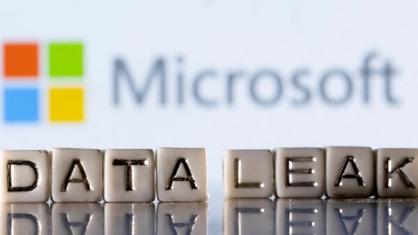 Plastic letters arranged to read Data Leak are placed in front of the Microsoft logo in this illustration taken March 9, 2022. - Sputnik International