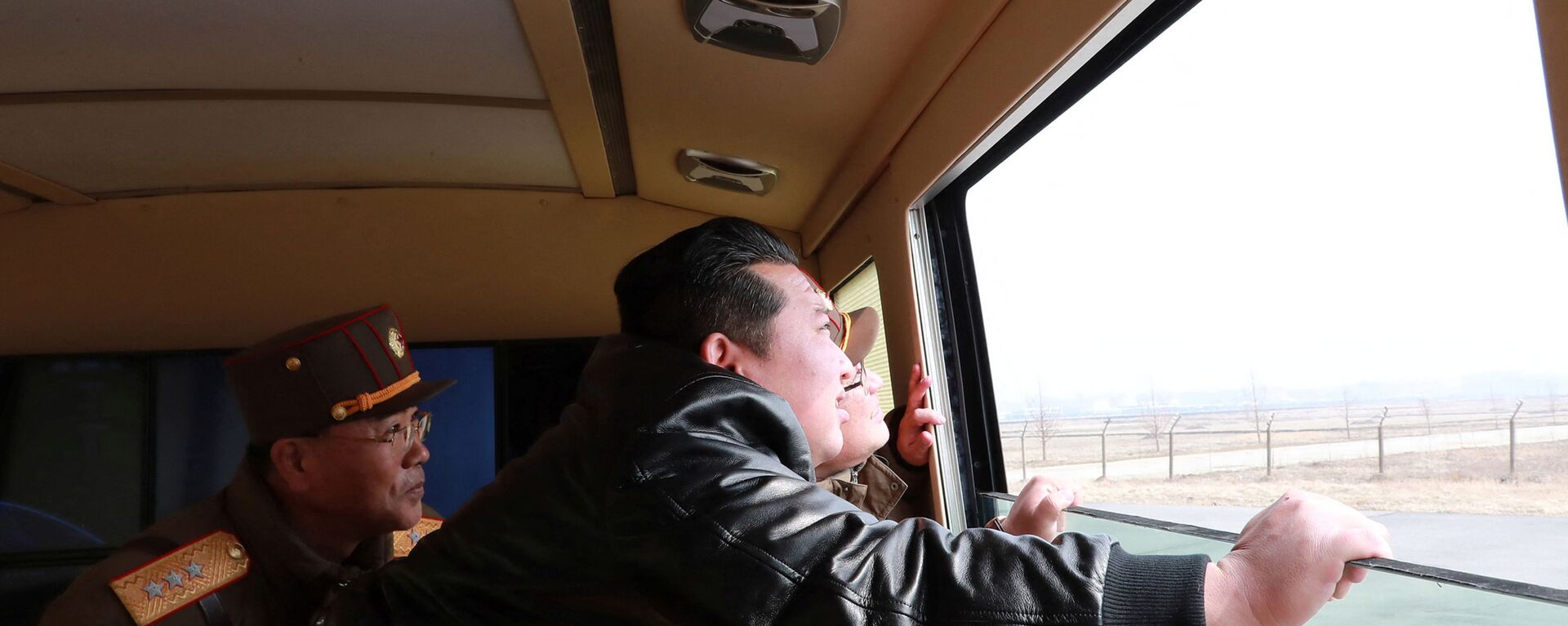 North Korean leader Kim Jong Un looks through a window during the test firing of what state media report is a new type of intercontinental ballistic missile (ICBM) in this undated photo released on March 24, 2022 by North Korea's Korean Central News Agency (KCNA). - Sputnik International, 1920, 17.04.2022