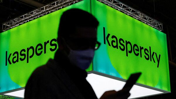A man walks next to Russian Kaspersky stand during the GSMA's 2022 Mobile World Congress (MWC), in Barcelona, Spain, March 2, 2022.  - Sputnik International