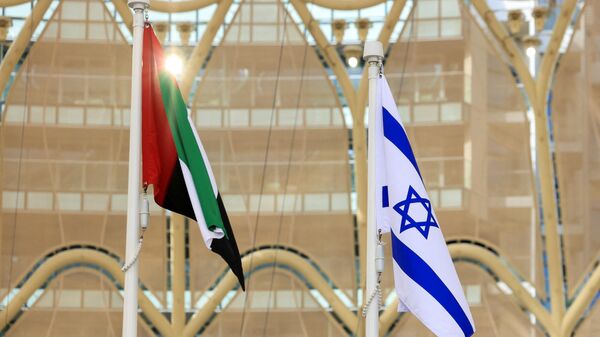 Flags of United Arab Emirates and Israel flutter during Israel's National Day ceremony at Expo 2020 Dubai, in Dubai, United Arab Emirates, January 31, 2022. REUTERS/Christopher Pike/File Photo - Sputnik International