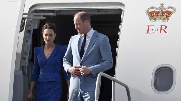In this file photo taken on March 19, 2022 Britain's Prince William, Duke of Cambridge, and Britain's Catherine, Duchess of Cambridge, arrive at Belize City's International Airport at the start of their Caribbean tour - Sputnik International