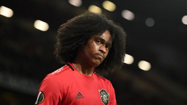 Manchester United's Dutch midfielder Tahith Chong leaves the field during the UEFA Europa League Group L football match between Manchester United and Astana at Old Trafford in Manchester, north west England, on 19 September, 2019. - Sputnik International