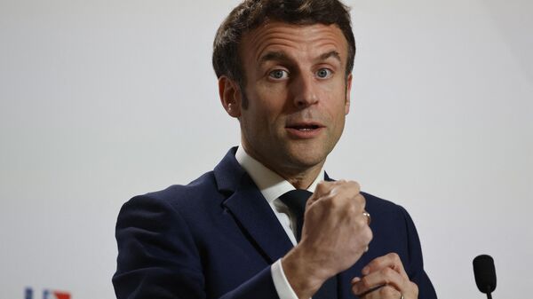 France's President Emmanuel Macron gestures as he talks to the press on the second day of a European Union (EU) summit at the EU Headquarters, in Brussels on March 25, 2022 - Sputnik International