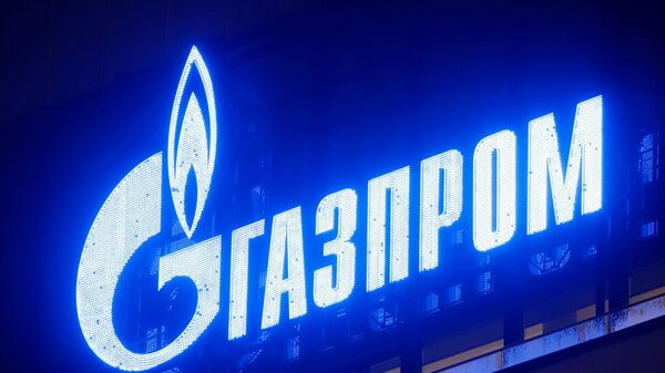 FILE PHOTO: The logo of Gazprom company is seen on the facade of a business centre in Saint Petersburg - Sputnik International