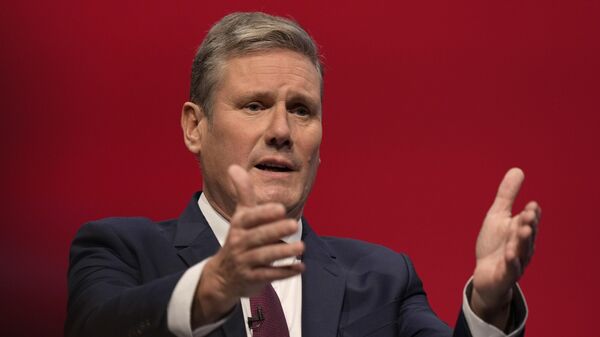 FILE - Leader of the British Labour Party Keir Starmer gestures as he makes his keynote speech at the annual party conference in Brighton, England, Sept. 29, 2021.  - Sputnik International