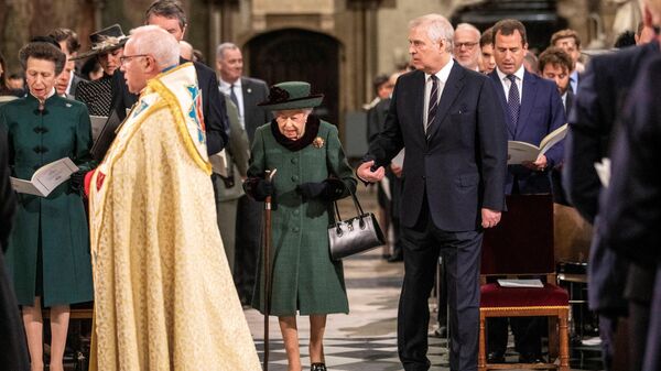 Britain's Queen Elizabeth, accompanied by Prince Andrew, Duke of York, attends a service of thanksgiving for late Prince Philip, Duke of Edinburgh, at Westminster Abbey in London, Britain, March 29, 2022 - Sputnik International