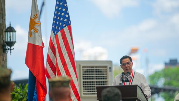 Philippine Undersecretary for the Department of National Defense Cardozo Luna, delivers remarks during the opening ceremony for exercise Balikatan 22 at Camp Aguinaldo, Quezon City, Philippines, March 28, 2022. - Sputnik International