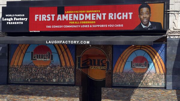 A message expressing support for comedian Chris Rock is displayed on the digital marquee of the Laugh Factory comedy club, Wednesday, March 30, 2022, in Los Angeles. - Sputnik International