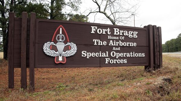 This Jan. 4, 2020 file photo shows a sign for at Fort Bragg, N.C. The push to remove Confederate names from Pentagon properties, including storied Army posts, could eventually affect hundreds of items and facilities, the chair of the congressionally chartered Naming Commission said Friday, May 21, 2021. - Sputnik International