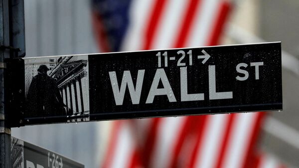 Raindrops hang on a sign for Wall Street outside the New York Stock Exchange in New York - Sputnik International