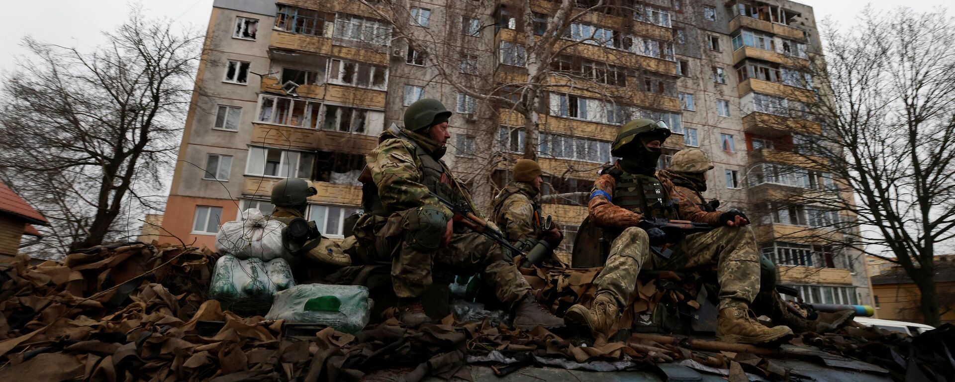Ukrainian soldiers are pictured on their military vehicle, amid Russia's invasion on Ukraine in Bucha, in Kyiv region, Ukraine April 2, 2022. - Sputnik International, 1920, 03.04.2022