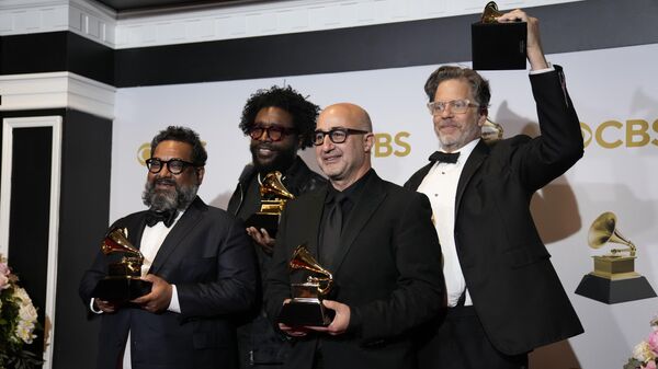 Joseph Patel, from left, Questlove, David Dinerstein and Robert Fyvolent, winners of the award for best music film for Summer of Soul, pose in the press room at the 64th Annual Grammy Awards at the MGM Grand Garden Arena on Sunday, April 3, 2022, in Las Vegas. - Sputnik International